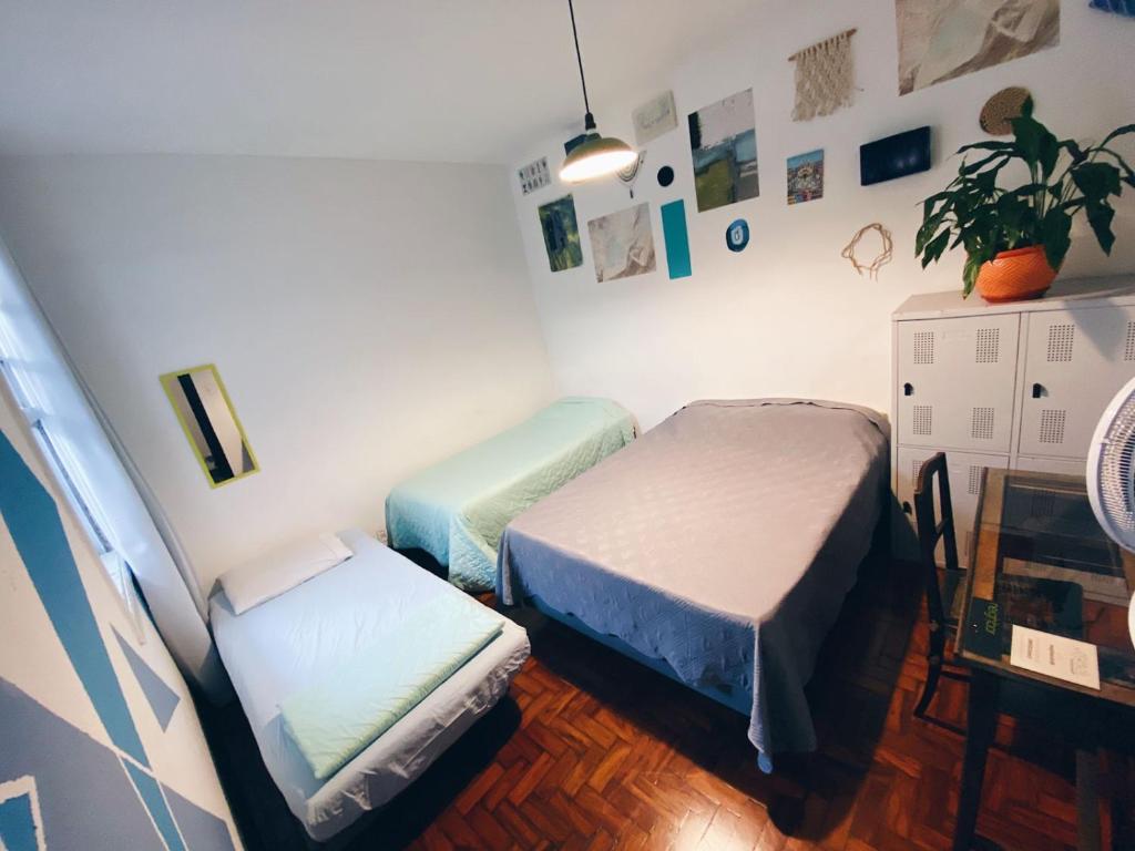 Postel nebo postele na pokoji v ubytování NeighborHUB hostel e coliving