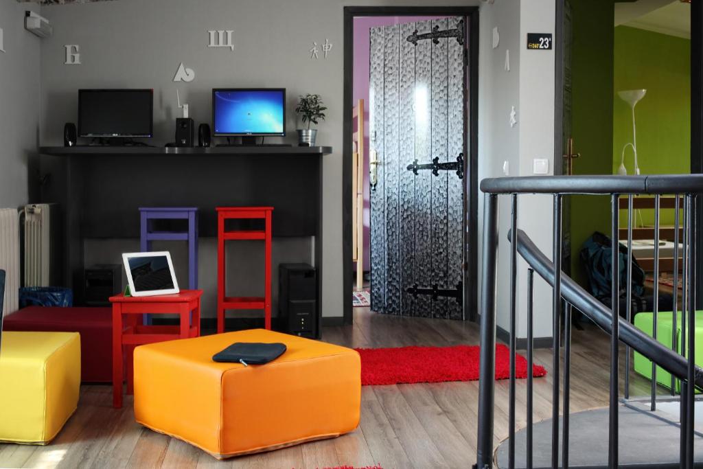 TV a/nebo společenská místnost v ubytování Hostel Bed&Coffee 360°