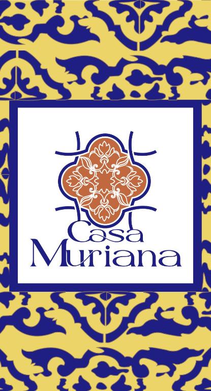 a set of two logos for a company with a ethnic pattern at Casa Muriana in Alanís