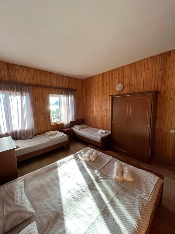 Postel nebo postele na pokoji v ubytování EVRIKA hotel Shekvetili