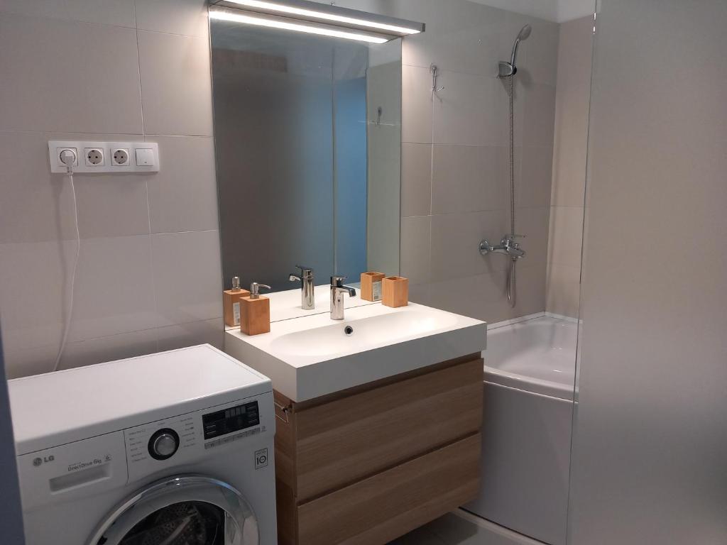 Koupelna v ubytování Korvin Plus Apartman