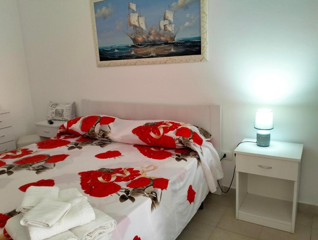 Postel nebo postele na pokoji v ubytování Orazio U Vitturisi