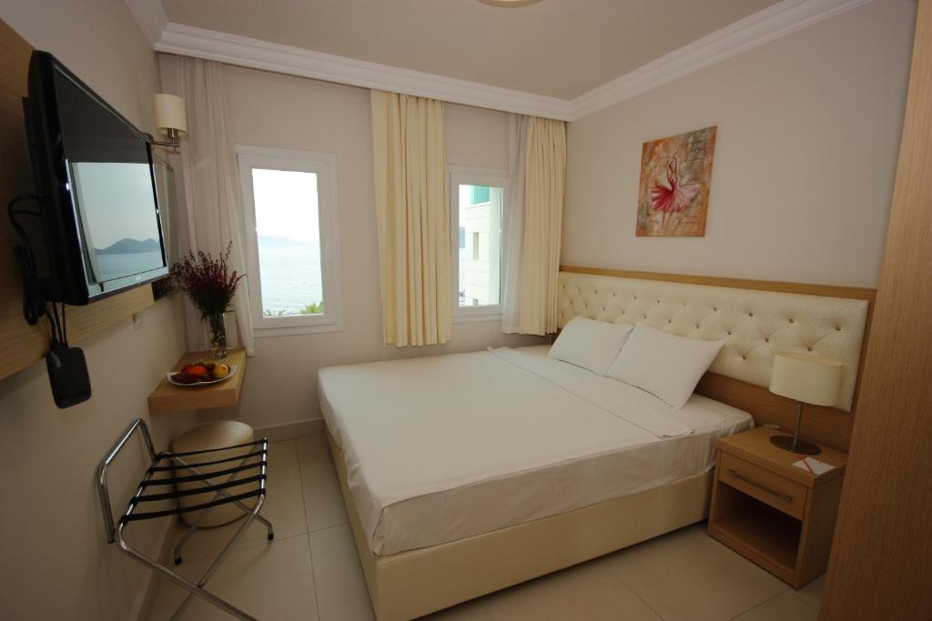 Postel nebo postele na pokoji v ubytování Dragut Point North Hotel - All Inclusive