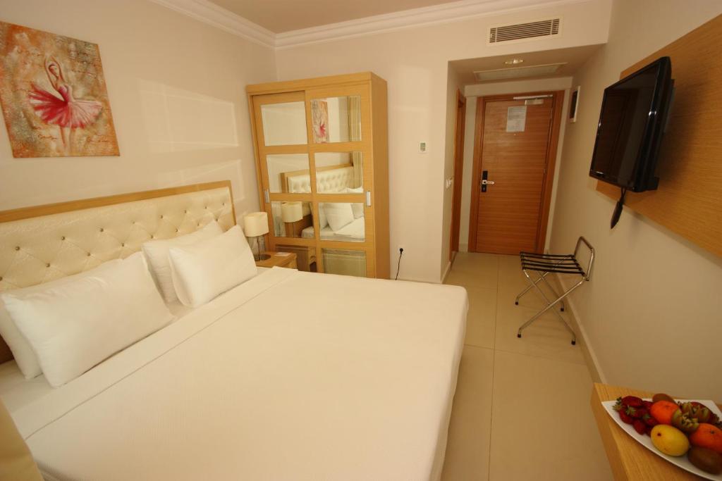 Postel nebo postele na pokoji v ubytování Dragut Point North Hotel - All Inclusive