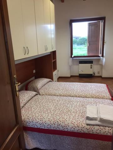 Postel nebo postele na pokoji v ubytování Foresto Case Vacanza