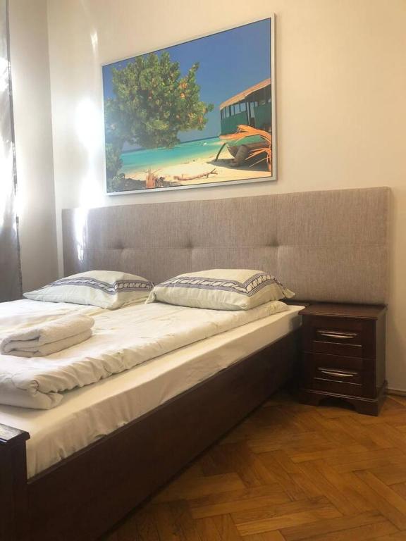 Posteľ alebo postele v izbe v ubytovaní P&J Apartamenty Św. Krzyża