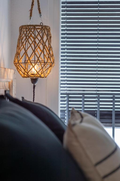 Postel nebo postele na pokoji v ubytování Hostal Boutique Es Menut