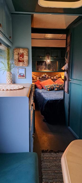 a room with two beds in a room with at Przyczepa Mumbai in Jastarnia