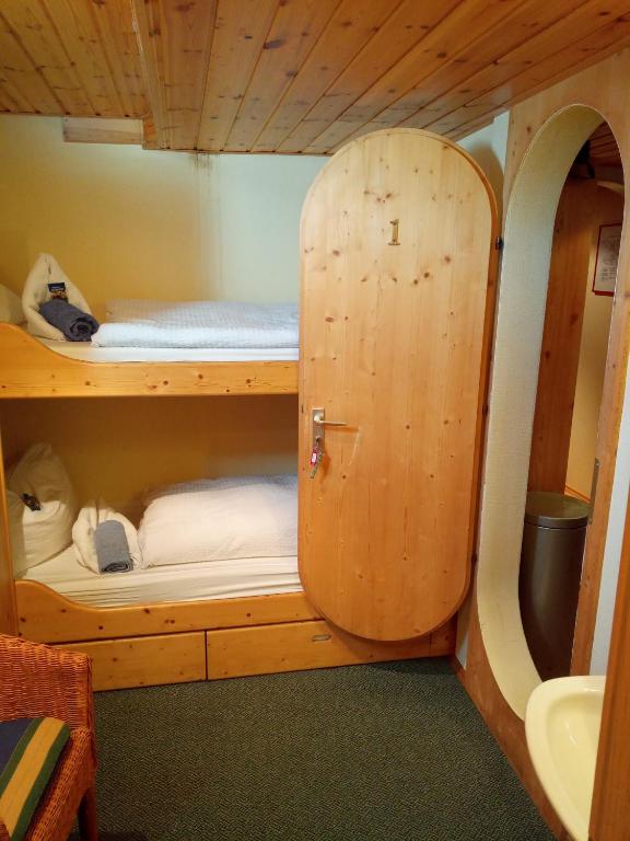 Postel nebo postele na pokoji v ubytování Küstenmotorschiff Aventura
