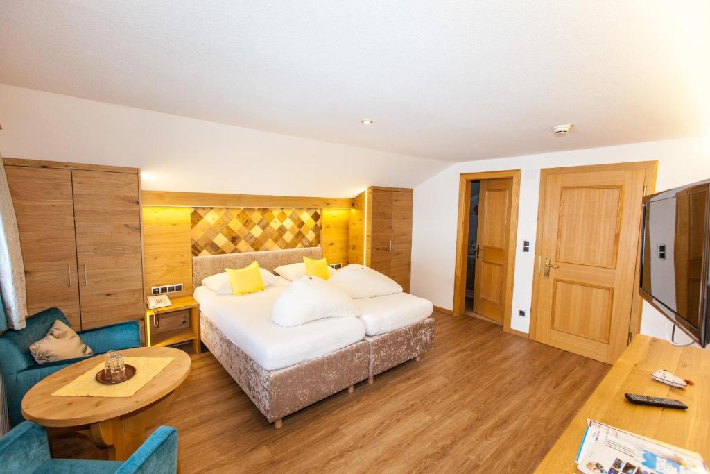 Postel nebo postele na pokoji v ubytování Hotel Schlosshof