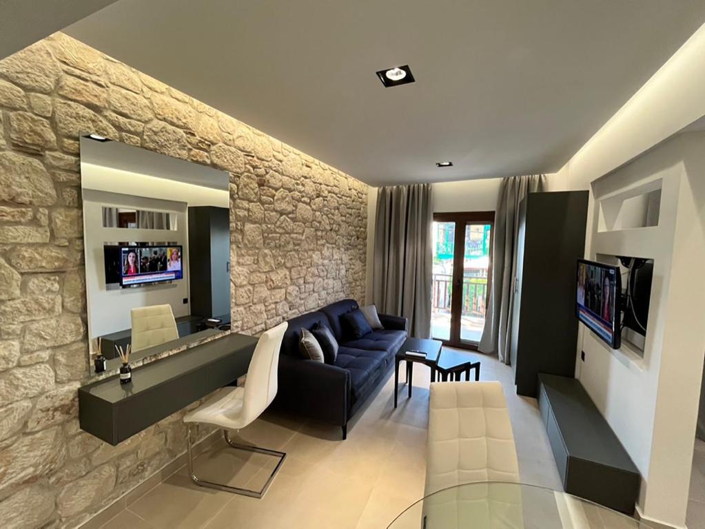 TV a/nebo společenská místnost v ubytování InLofts