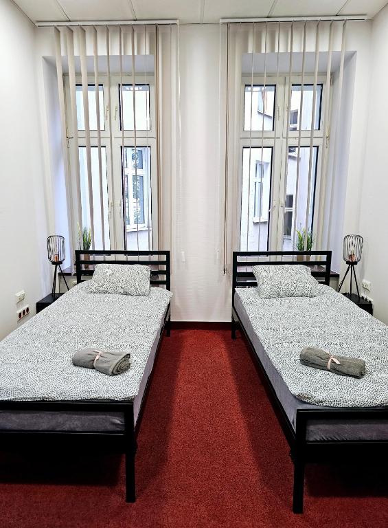 Postel nebo postele na pokoji v ubytování Noclegi Wałbrzych Centrum