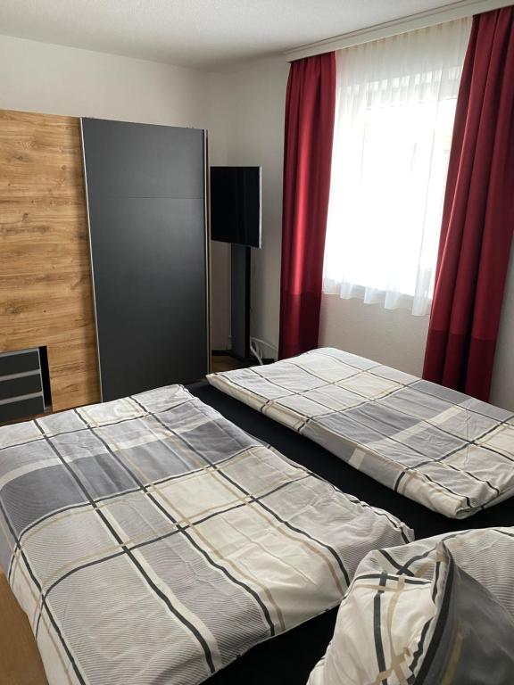 Postel nebo postele na pokoji v ubytování Alpenglück
