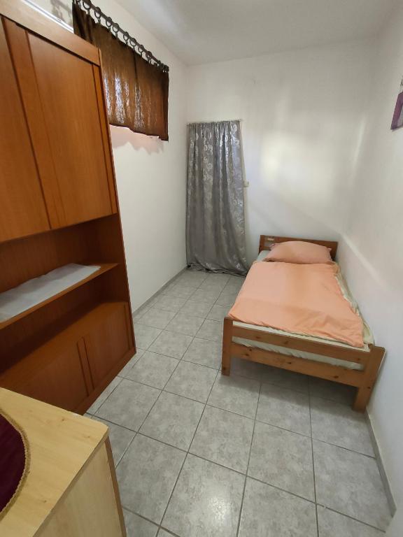 Postel nebo postele na pokoji v ubytování Kékturás-Tóra-Nyíló privát bérlemény
