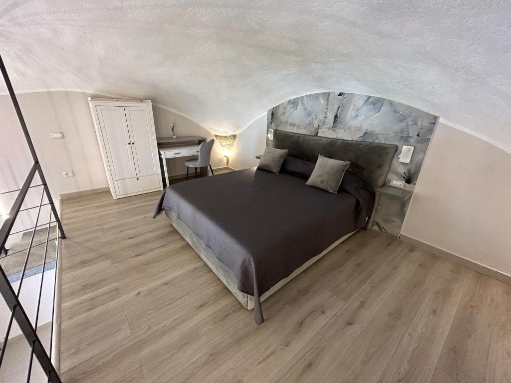 Postel nebo postele na pokoji v ubytování Affittacamere La Magnolia