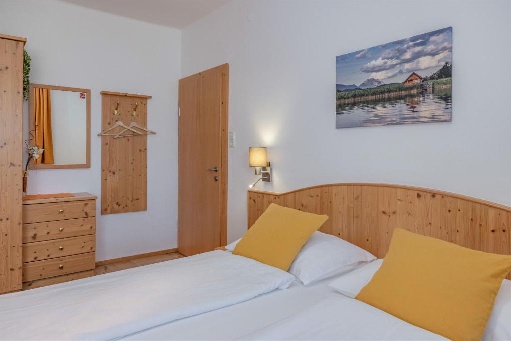 Postel nebo postele na pokoji v ubytování Haus Scheiblauer