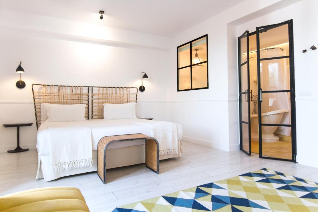 Postel nebo postele na pokoji v ubytování 7 Islas Hotel