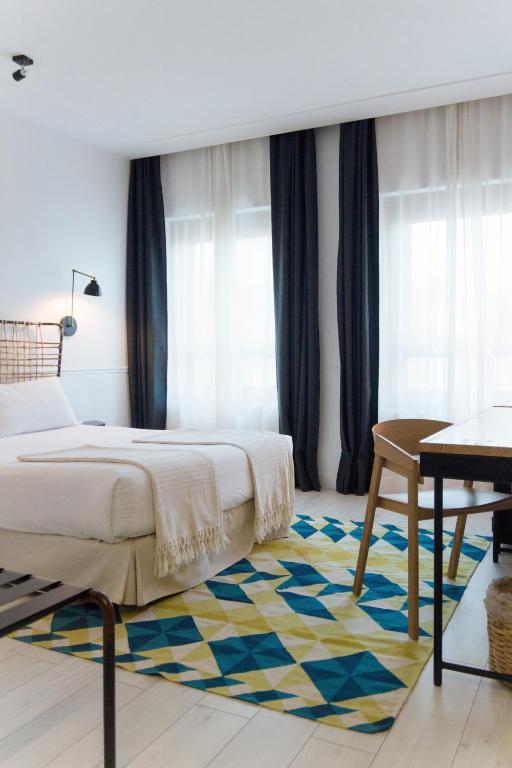 Postel nebo postele na pokoji v ubytování 7 Islas Hotel