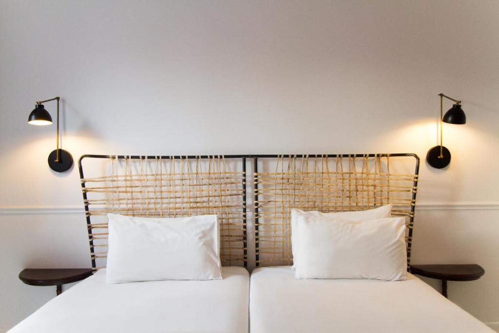 Postel nebo postele na pokoji v ubytování 7 Islas Hotel