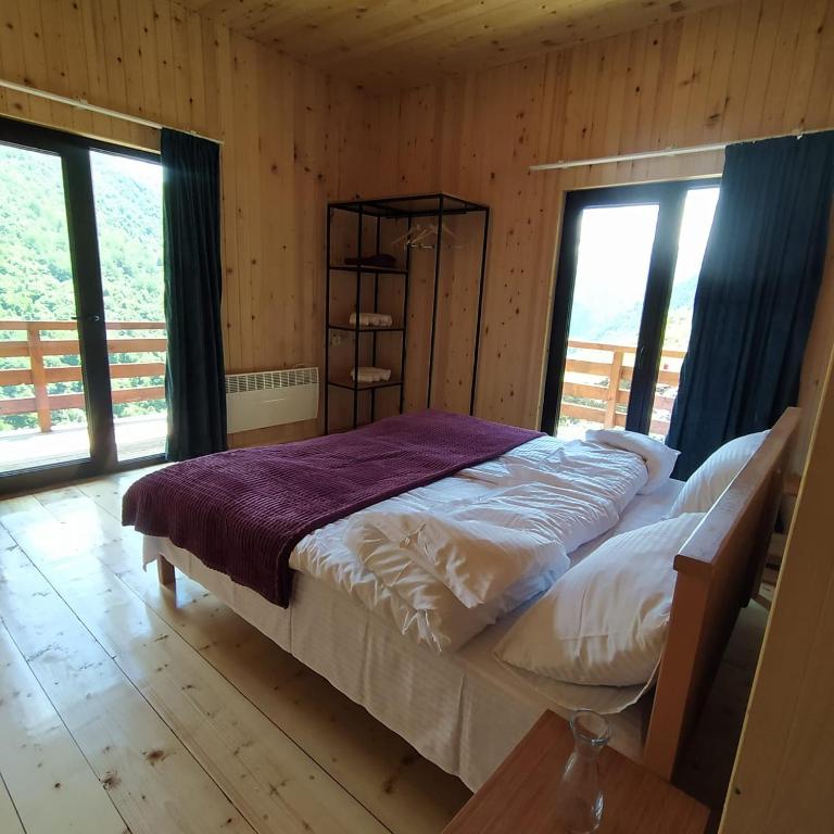 Postel nebo postele na pokoji v ubytování Gaul Gavkhe Hotel