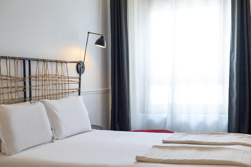 Postel nebo postele na pokoji v ubytování 7 Islas Hotel