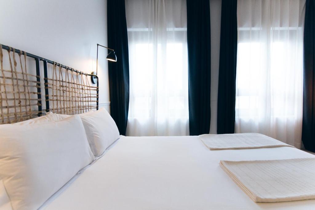 Postel nebo postele na pokoji v ubytování 7 Islas Hotel