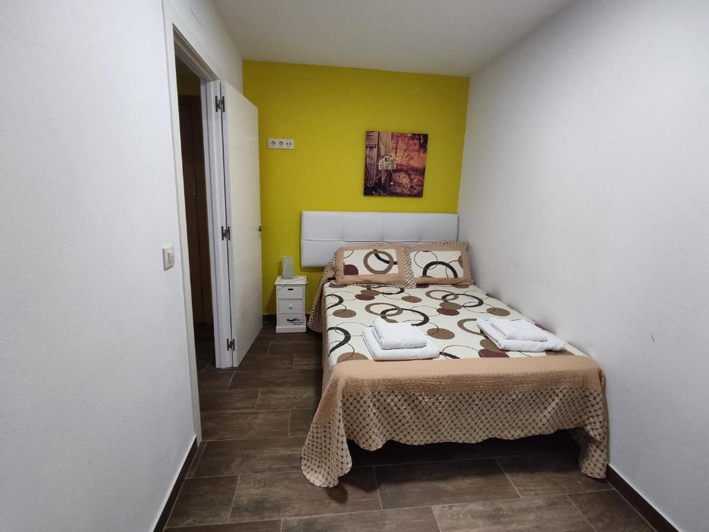 Posteľ alebo postele v izbe v ubytovaní RO Apartamentos Pampin Ponte Do Porto