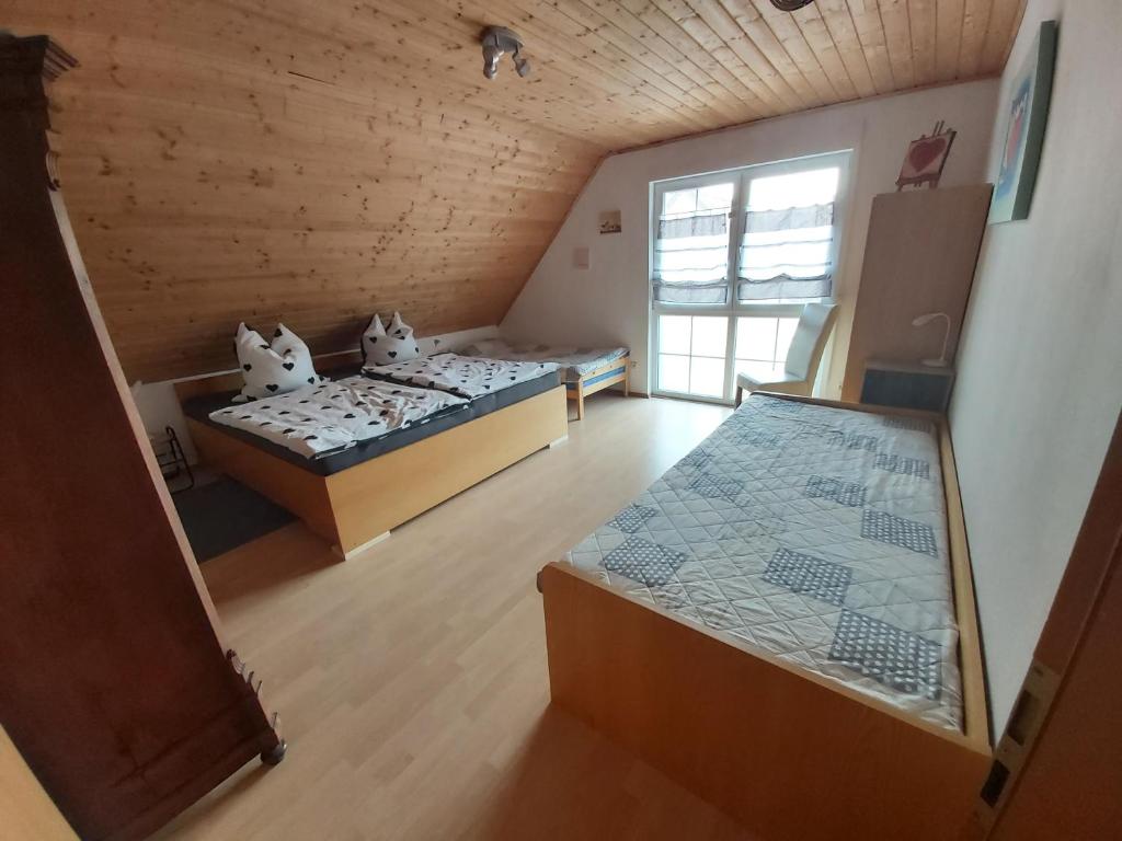 Postel nebo postele na pokoji v ubytování tAllhouse