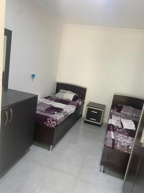 Postel nebo postele na pokoji v ubytování Maguli Home Gonio