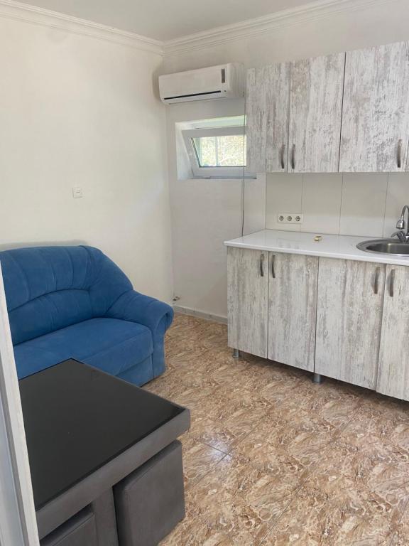 Posezení v ubytování Maguli Home Gonio
