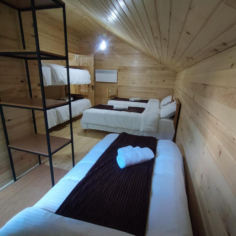 Postel nebo postele na pokoji v ubytování Gaul Gavkhe Hotel