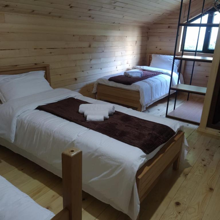 Postel nebo postele na pokoji v ubytování Gaul Gavkhe Hotel