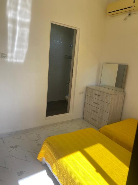 Postel nebo postele na pokoji v ubytování Maguli Home Gonio