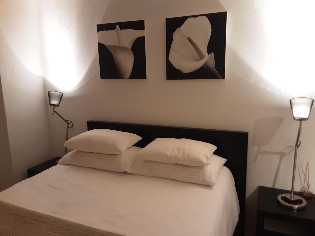 Postel nebo postele na pokoji v ubytování Dorf Hotel "Zuhause in Lachen"