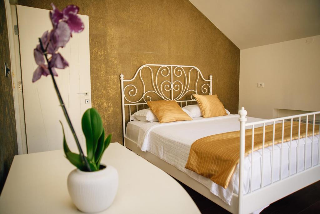 Postel nebo postele na pokoji v ubytování Filip Deluxe Rooms