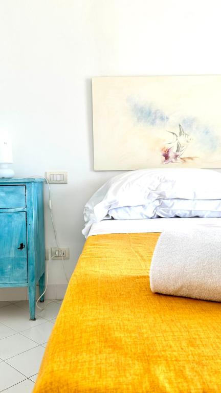 Postel nebo postele na pokoji v ubytování Villa La Zagara by CapriRooms