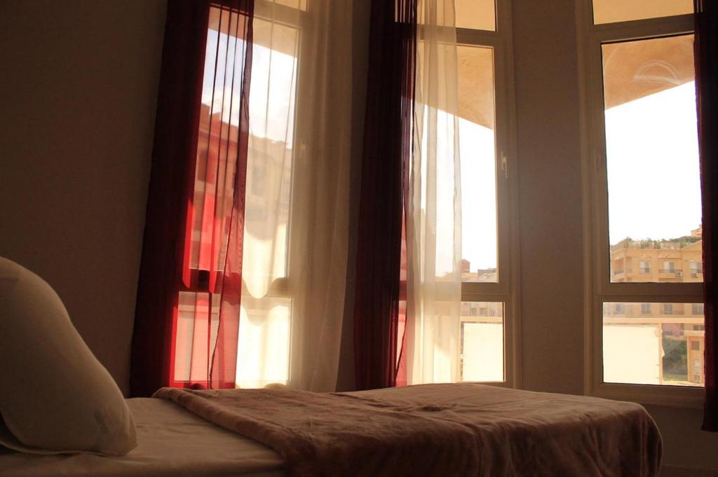 Postel nebo postele na pokoji v ubytování 610 rooms