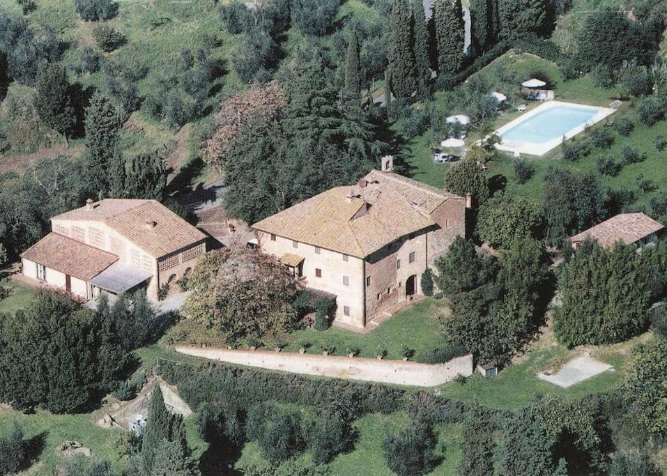 an aerial view of a large house on a hill at Podere San Giorgio in Palaia