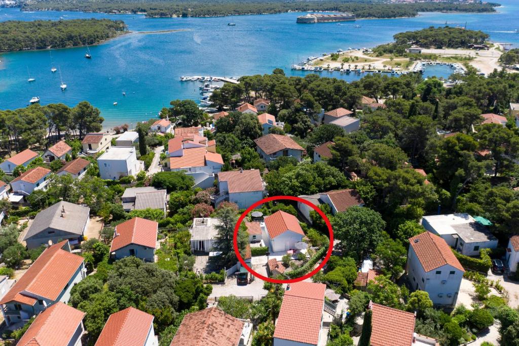 an aerial view of a house with a red circle at Holiday house with a parking space Jadrija, Sibenik - 20641 in Šibenik
