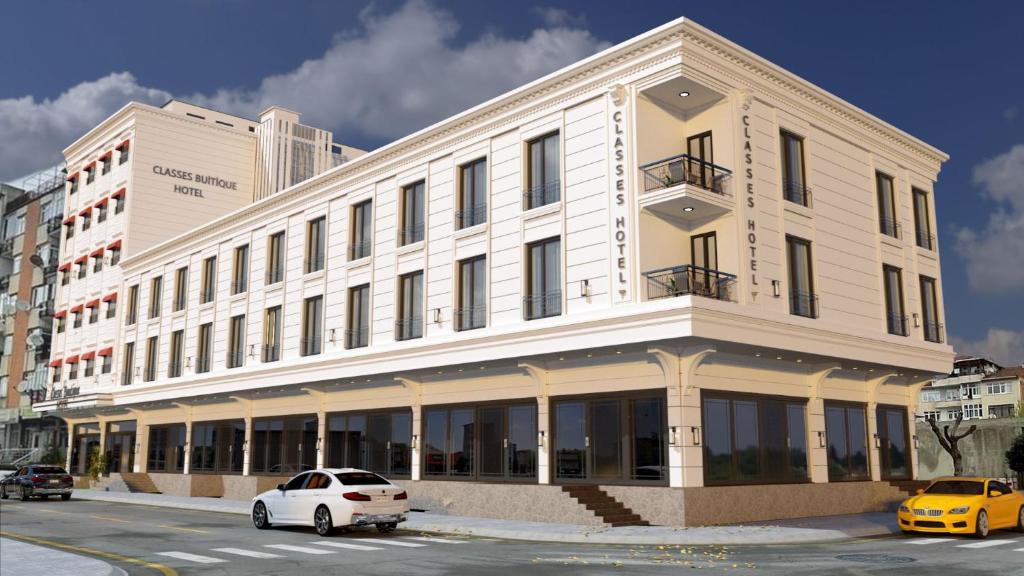 a white car parked in front of a building at Classes Hotel in Istanbul