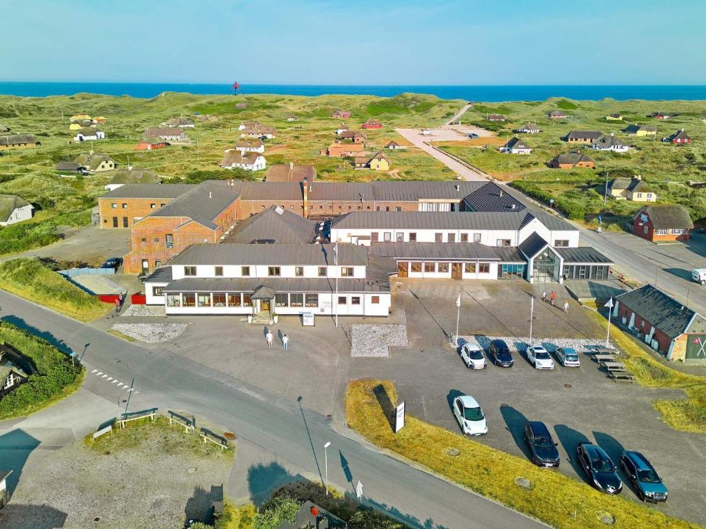 an aerial view of a building with a parking lot at Apartment in Holiday park- free waterpark in Ulfborg