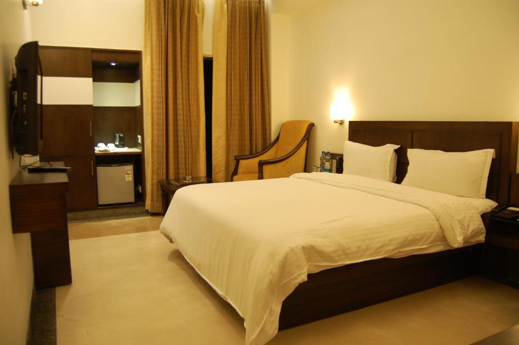 Postel nebo postele na pokoji v ubytování Hotel Taj Resorts