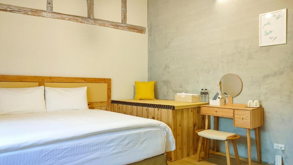 Postel nebo postele na pokoji v ubytování Island Flower Inn