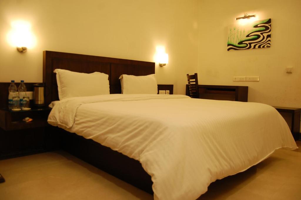 Postel nebo postele na pokoji v ubytování Hotel Taj Resorts