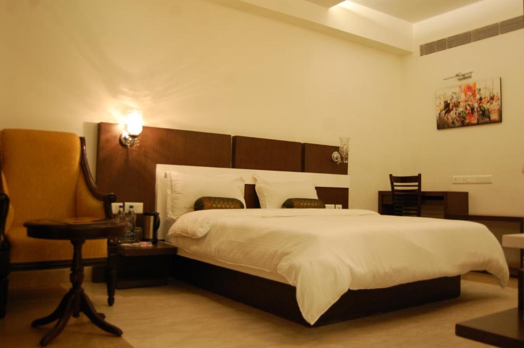 Postel nebo postele na pokoji v ubytování Hotel Taj Resorts
