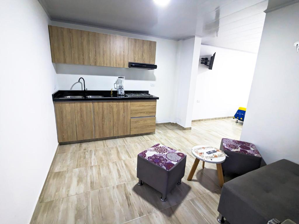 Kuchyň nebo kuchyňský kout v ubytování Apartaestudio para estrenar La Quinta