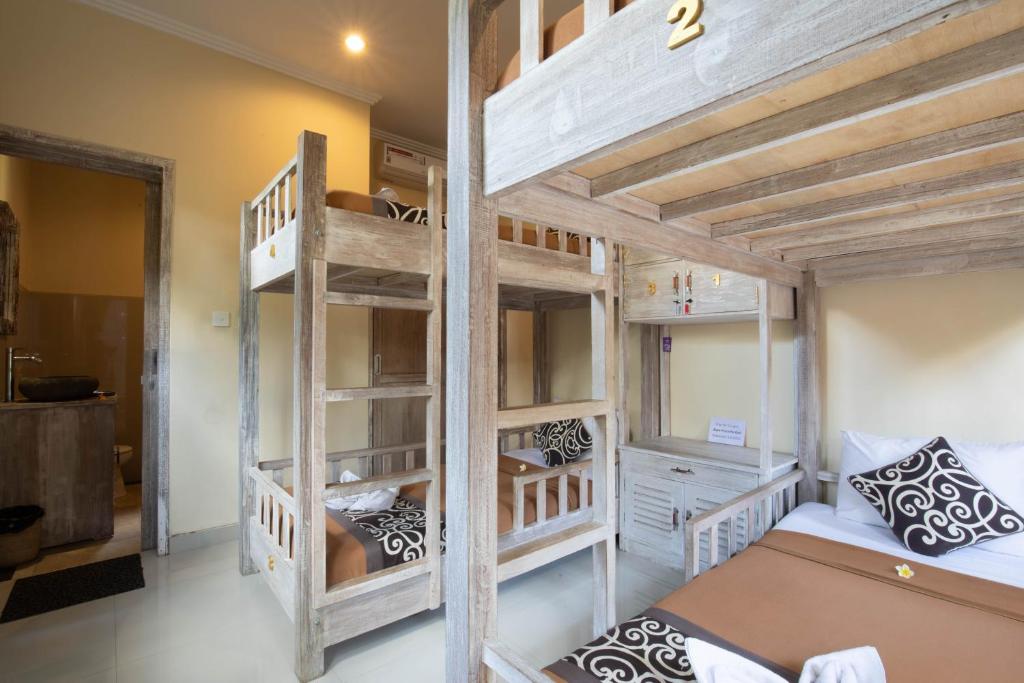 Postel nebo postele na pokoji v ubytování Alam Pracetha Bali Ubud