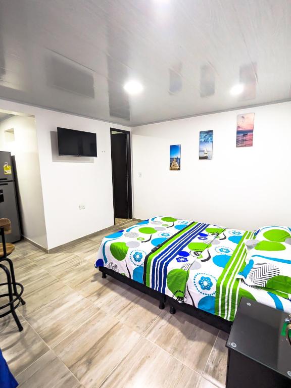 Postel nebo postele na pokoji v ubytování Apartaestudio para estrenar La Quinta