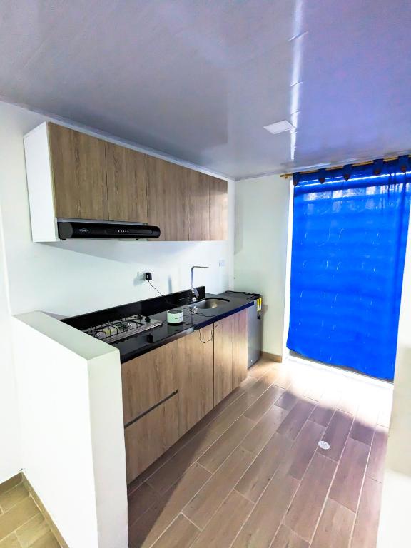 Kuchyň nebo kuchyňský kout v ubytování Apartaestudio para estrenar La Quinta