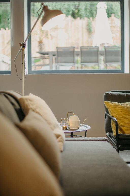 Posedenie v ubytovaní Grand loft avec Jacuzzi et Home Cinema